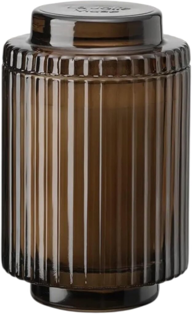 Bougie parfumée pour une décoration apaisante, créant une ambiance chaleureuse